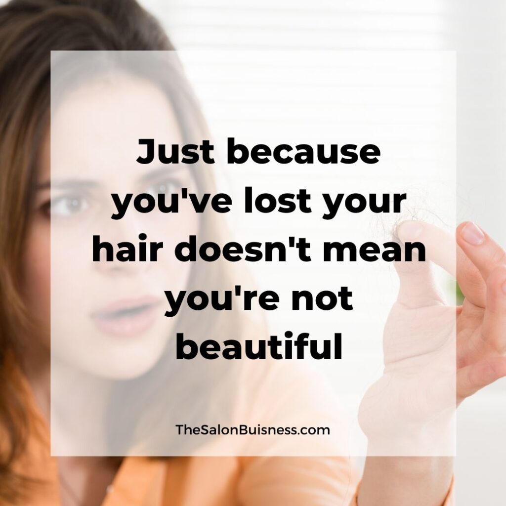  hair loss quotes   -  woman with brown hair holding loose hair