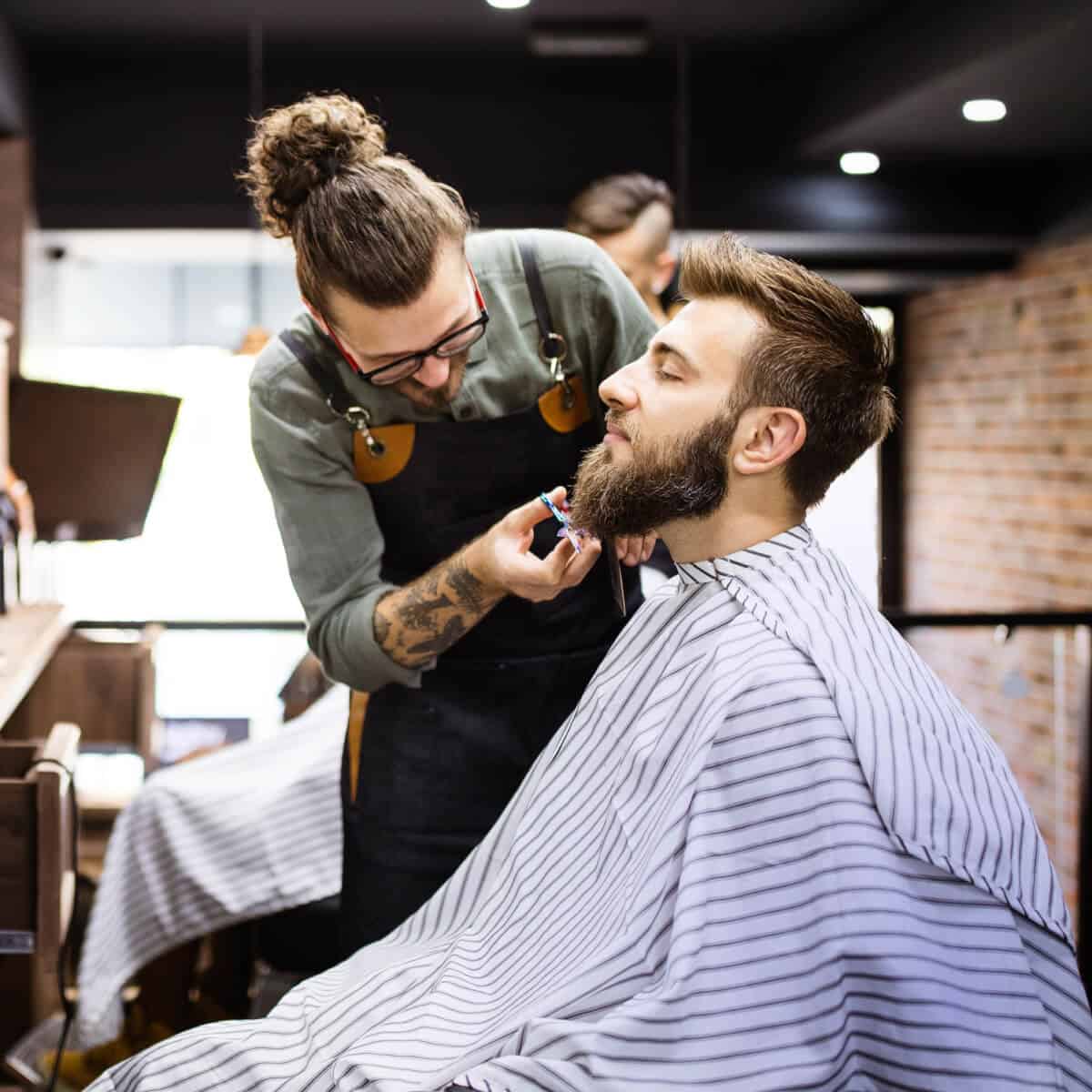 customer getting a cut in a barbershop
